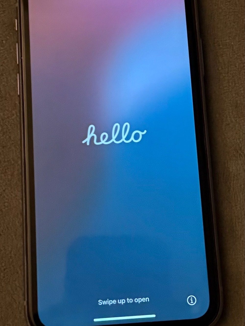 Apple iPhone with Black Frame and Blue Gradient Screen